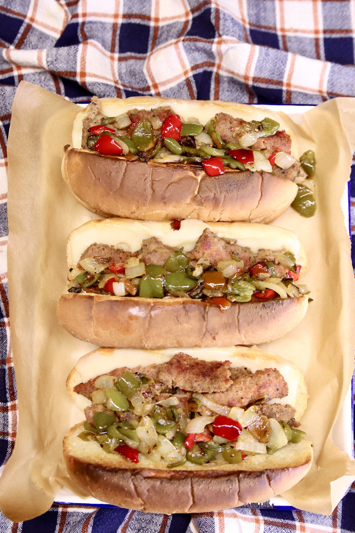 Tasted Smoked Sausage Pepper Hoagies on a tray.