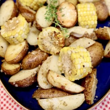 Baby potatoes and corn on the cob slices.