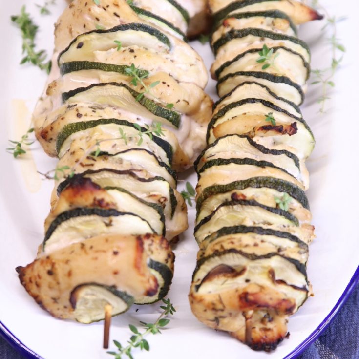 2 skewers of chicken and zucchini.