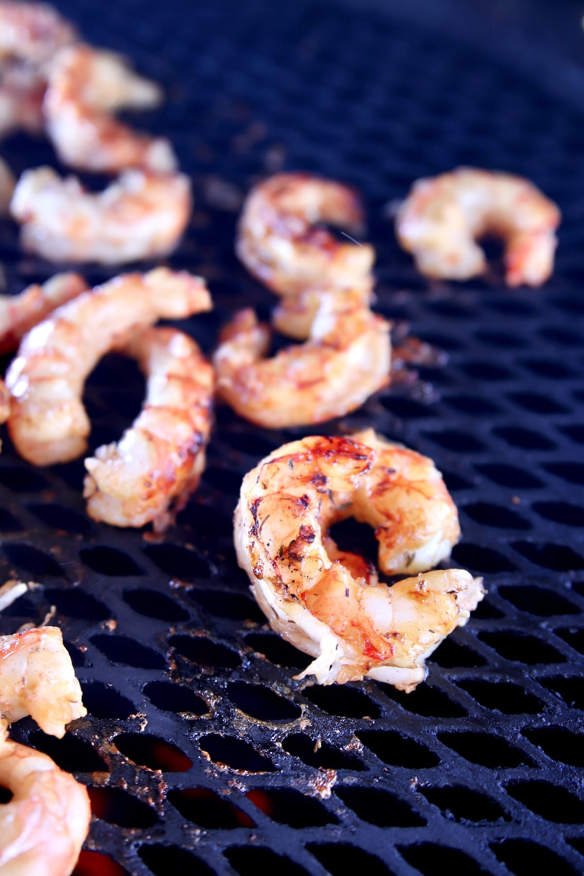 Closeup of shrimp on a grill.