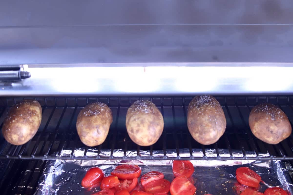 Baked potatoes on a pellet grill.