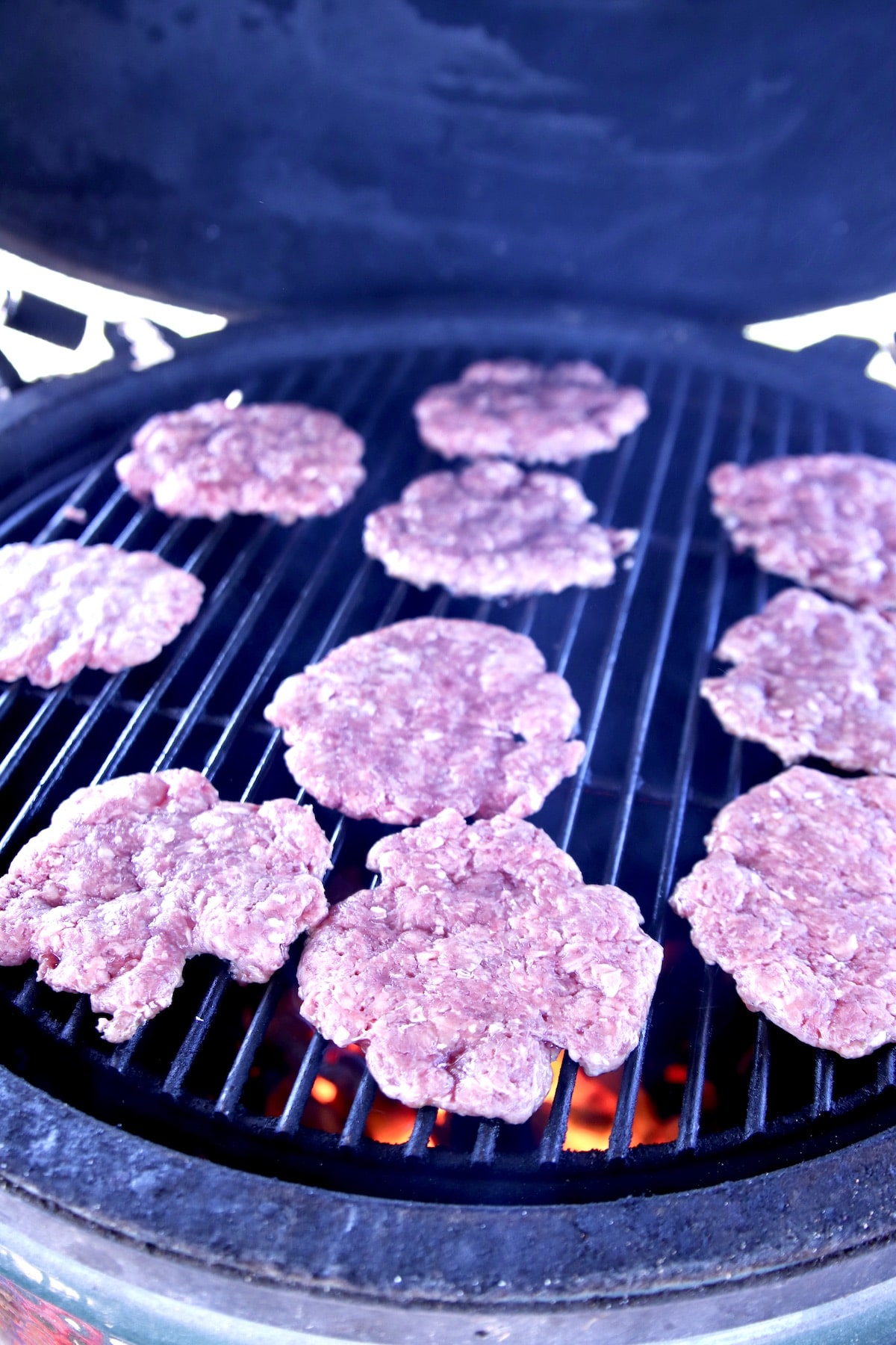 Burger patties on a grill.