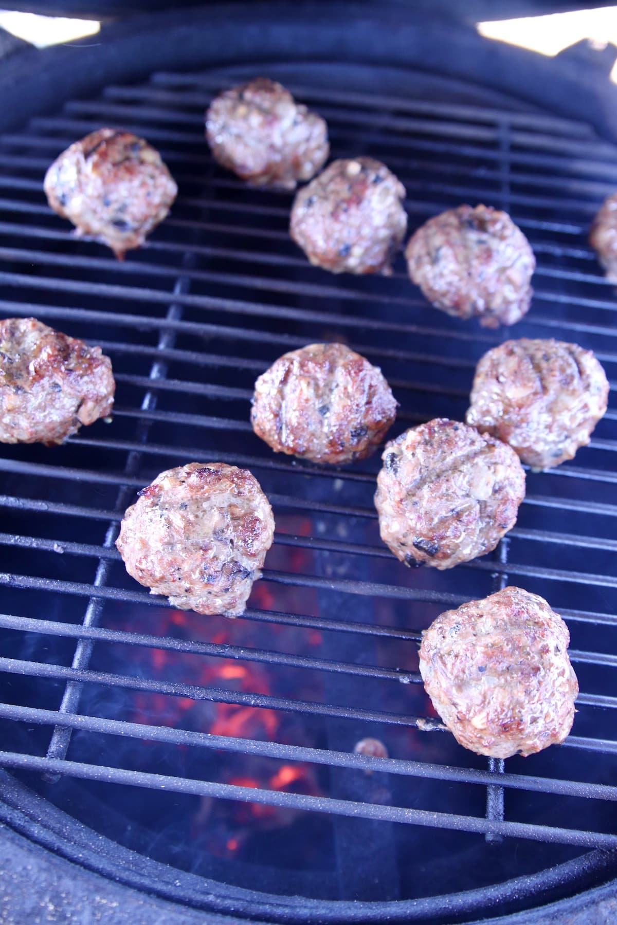 Grilling meatballs.