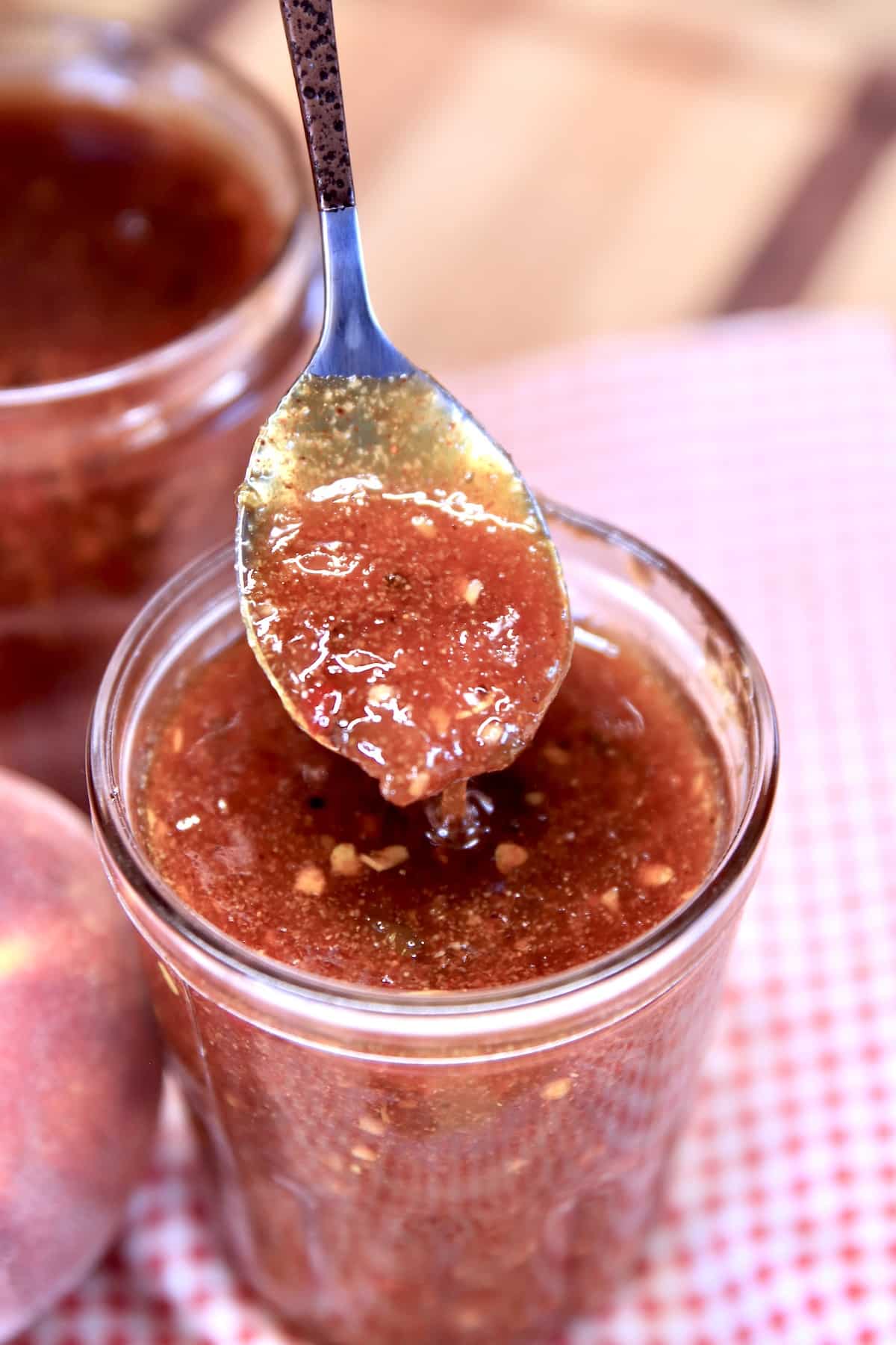 Spoonful of peach bbq sauce.