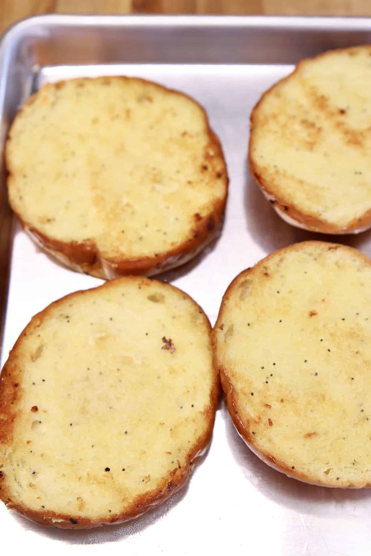 Buttered and toasted buns.