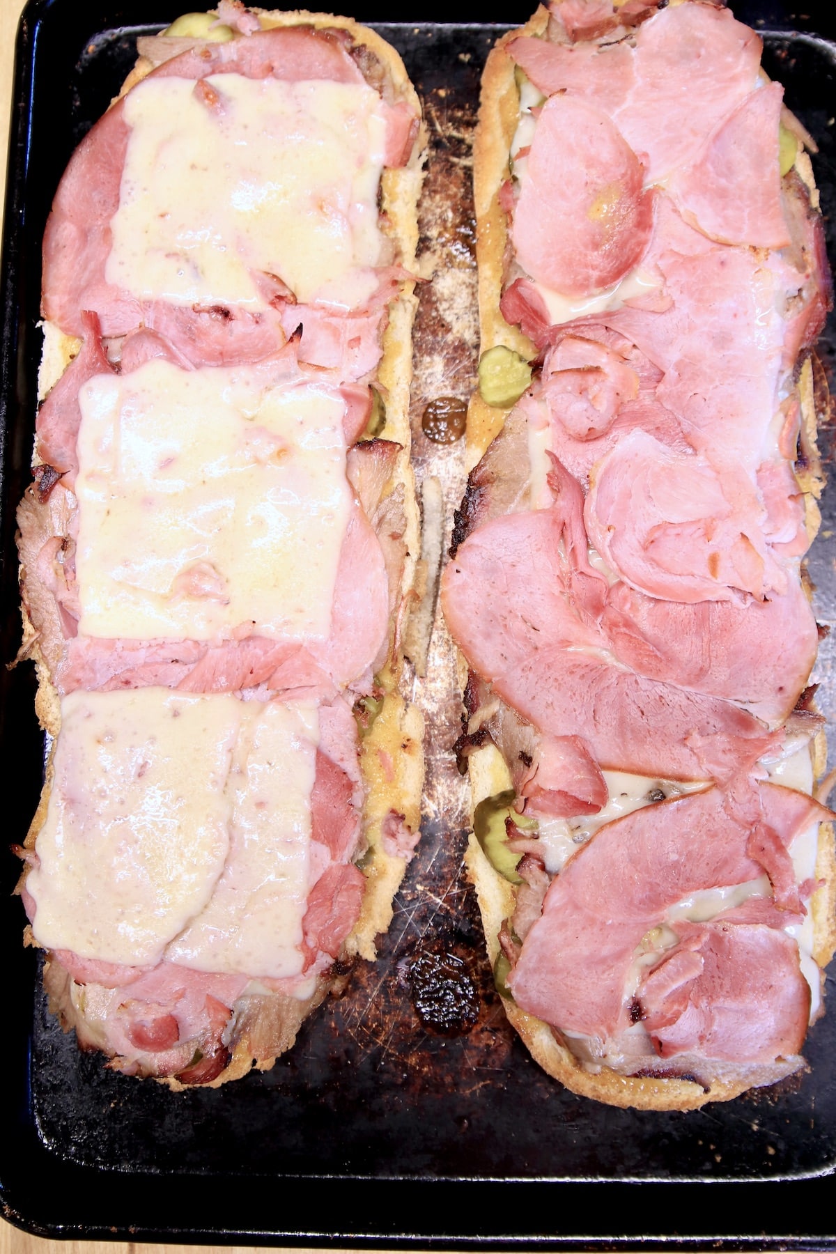 Toasted smoked pork sandwich on Italian loaf.