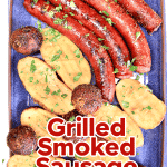 Platter of smoked sausage, potatoes and mushrooms. Text overlay.