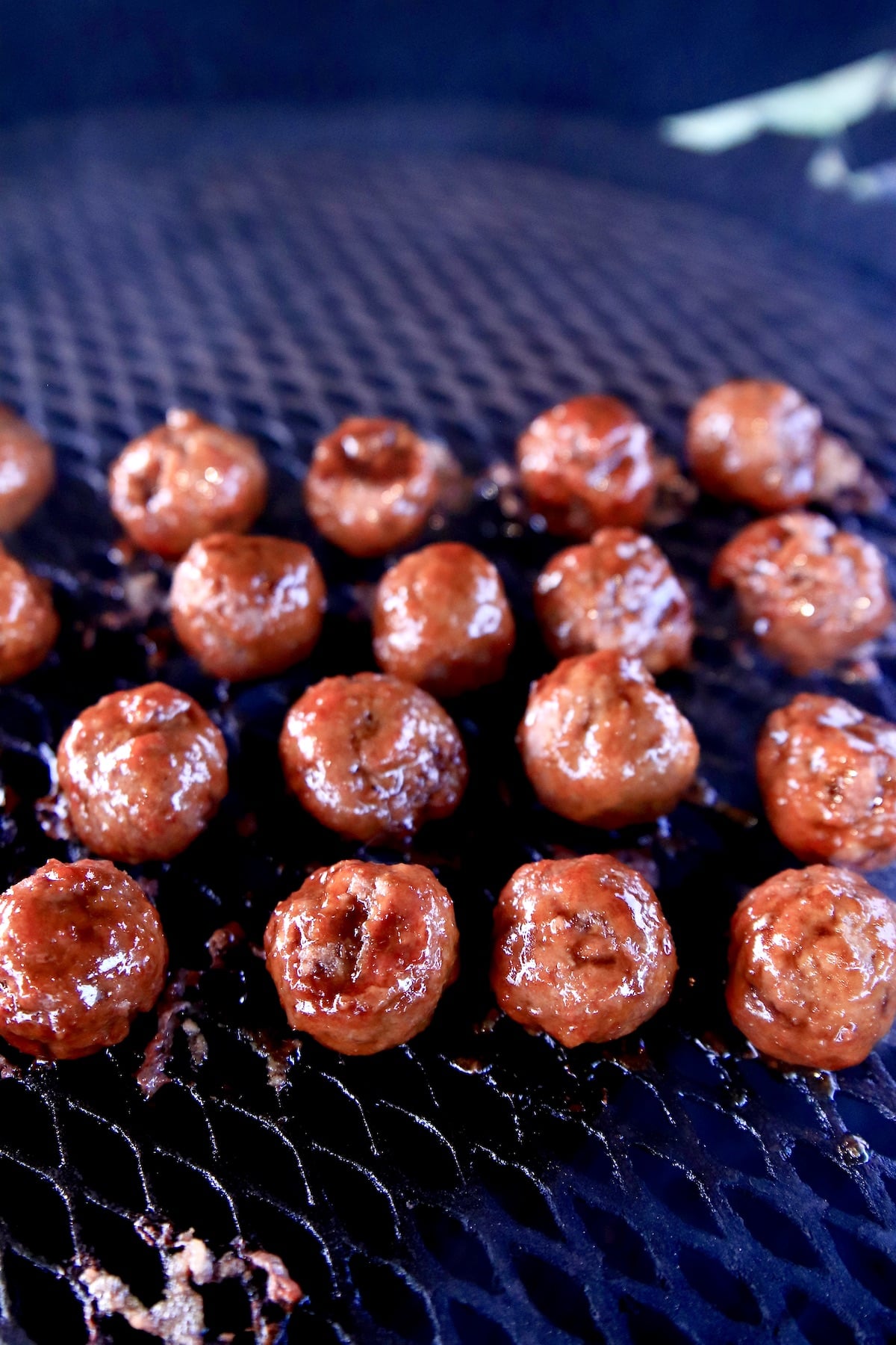 Teriyaki Meatballs on a grill.