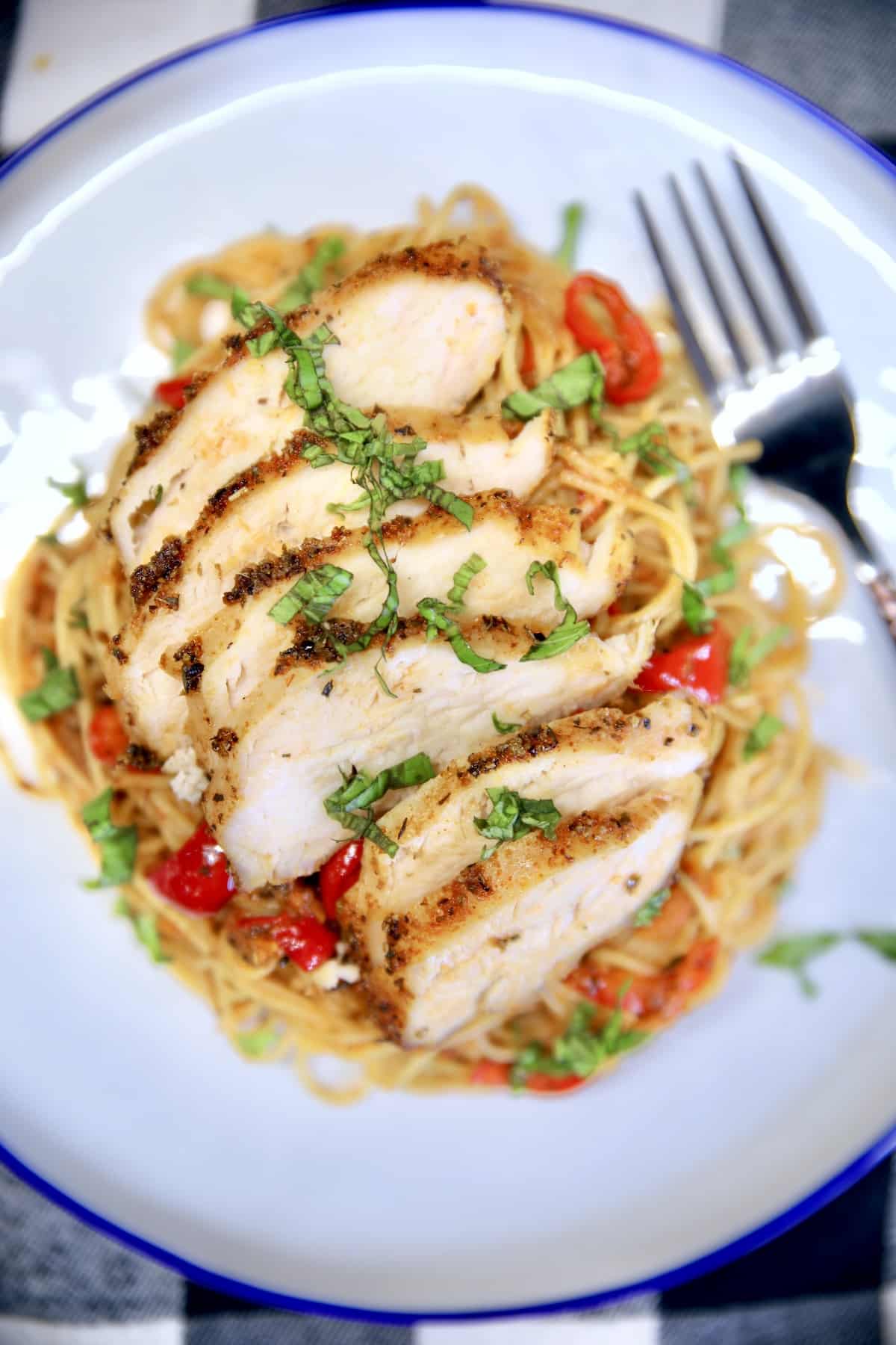 Closeup of plate of chicken spaghetti.