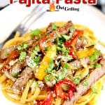 Plate of steak fajita pasta. Text overlay.