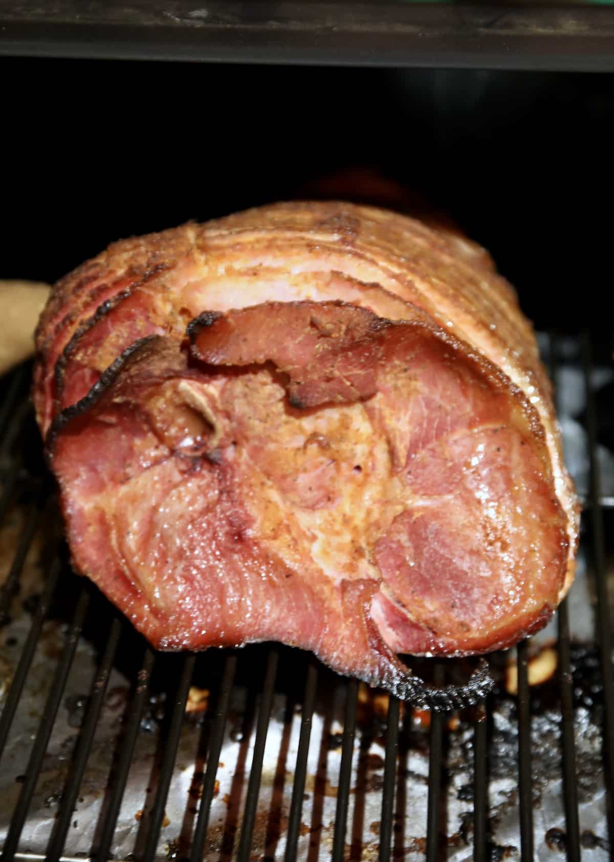 Glazed spiral ham on a pellet grill.