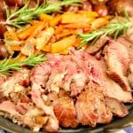 Platter of grilled roast beef and vegetables.