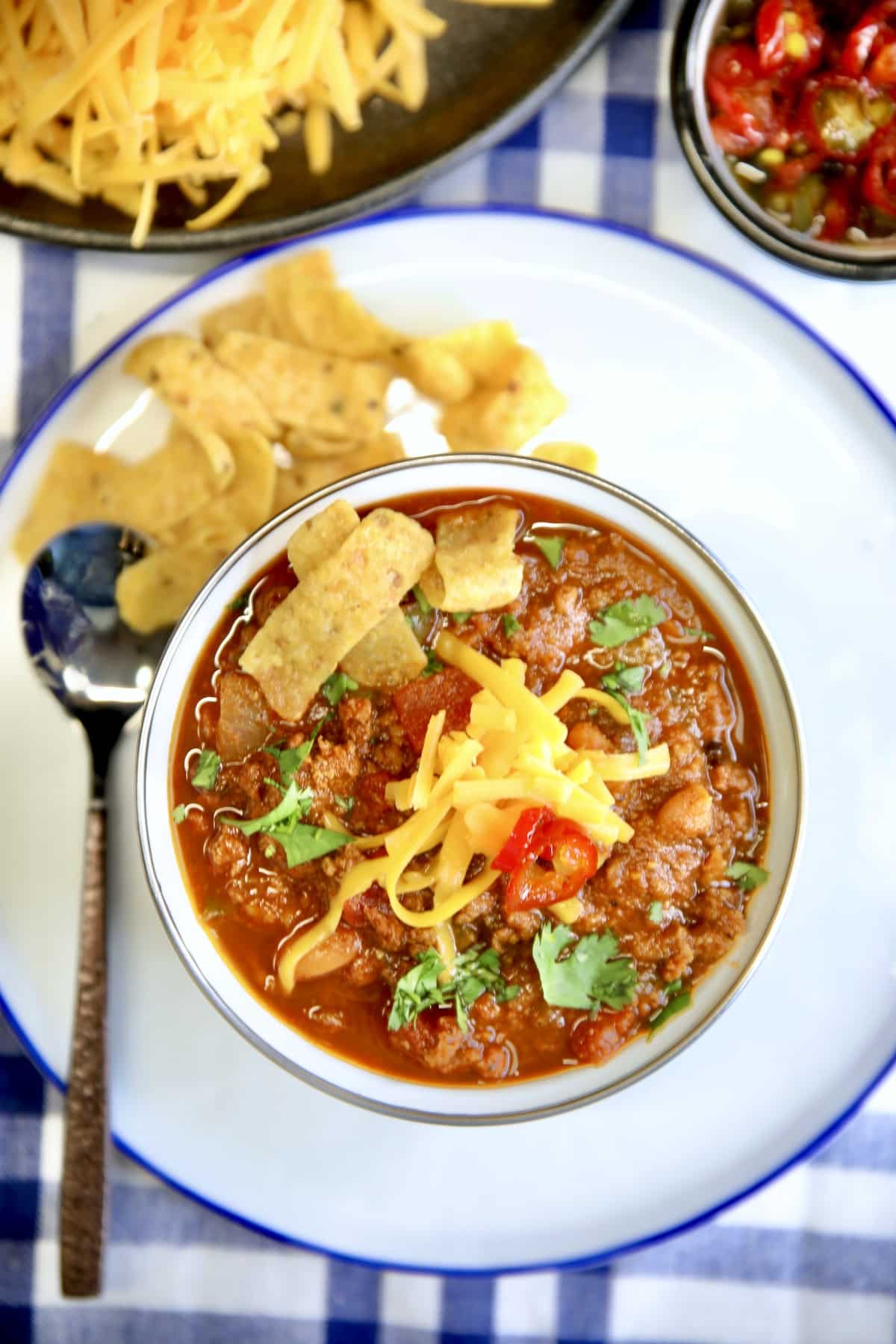 Bowl of chili with cheese.