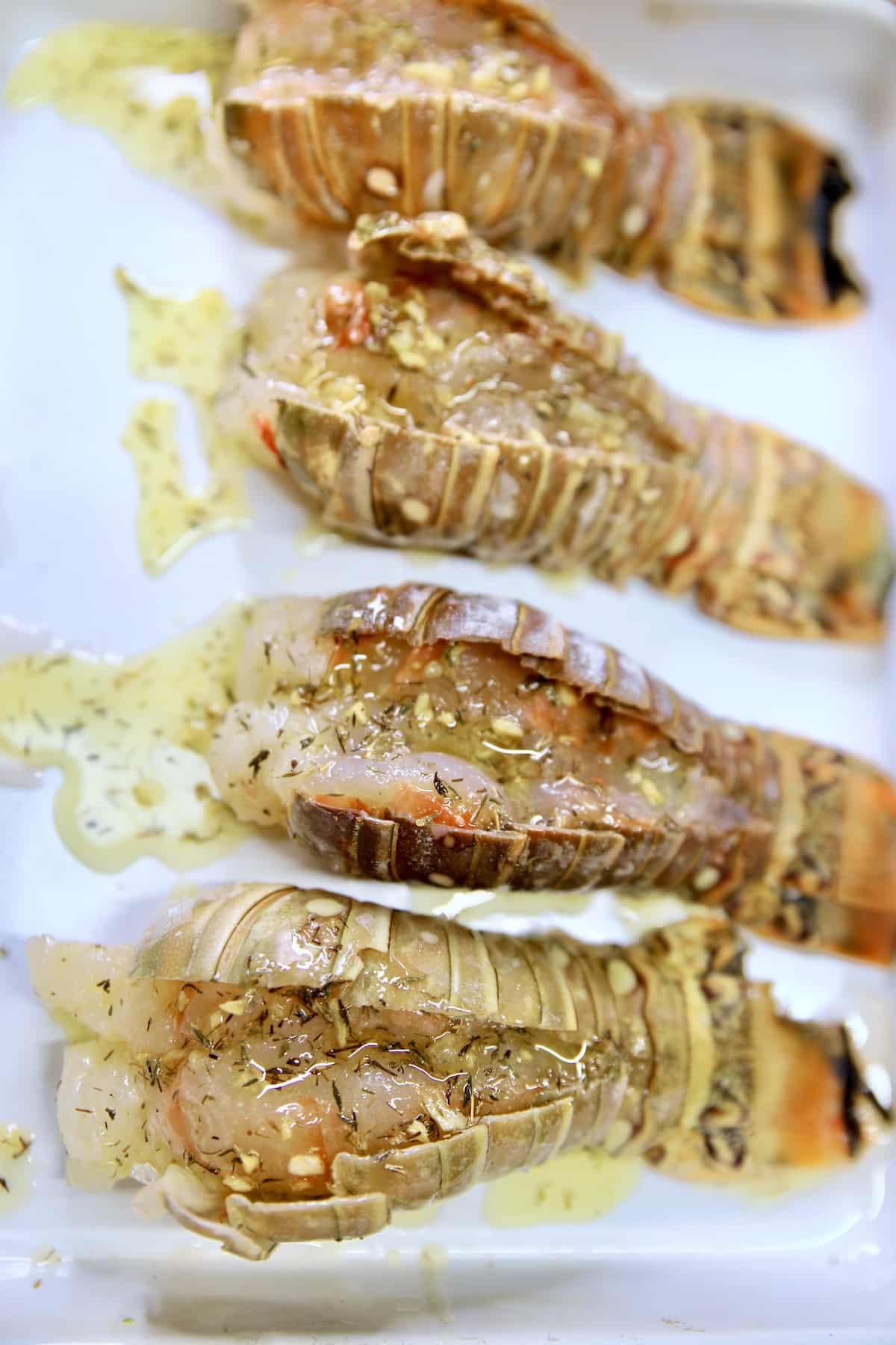 Lobster tails, split with garlic butter.