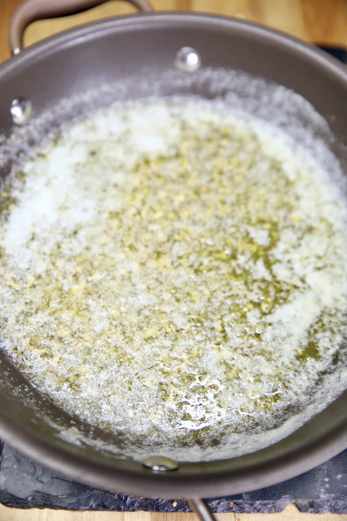 Garlic butter in a pan.