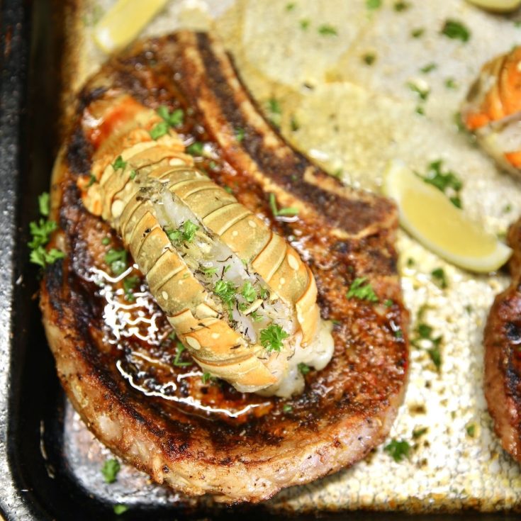 Ribeye Steak topped with lobster tail.