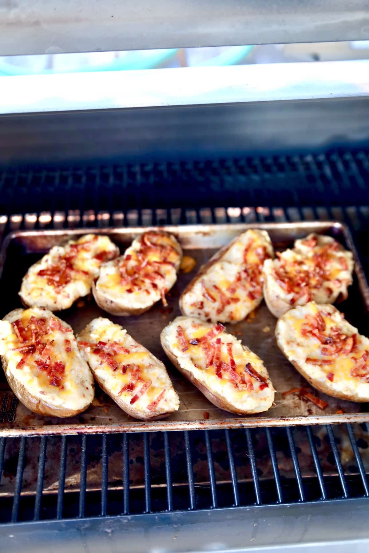 Grilling twice baked potatoes.