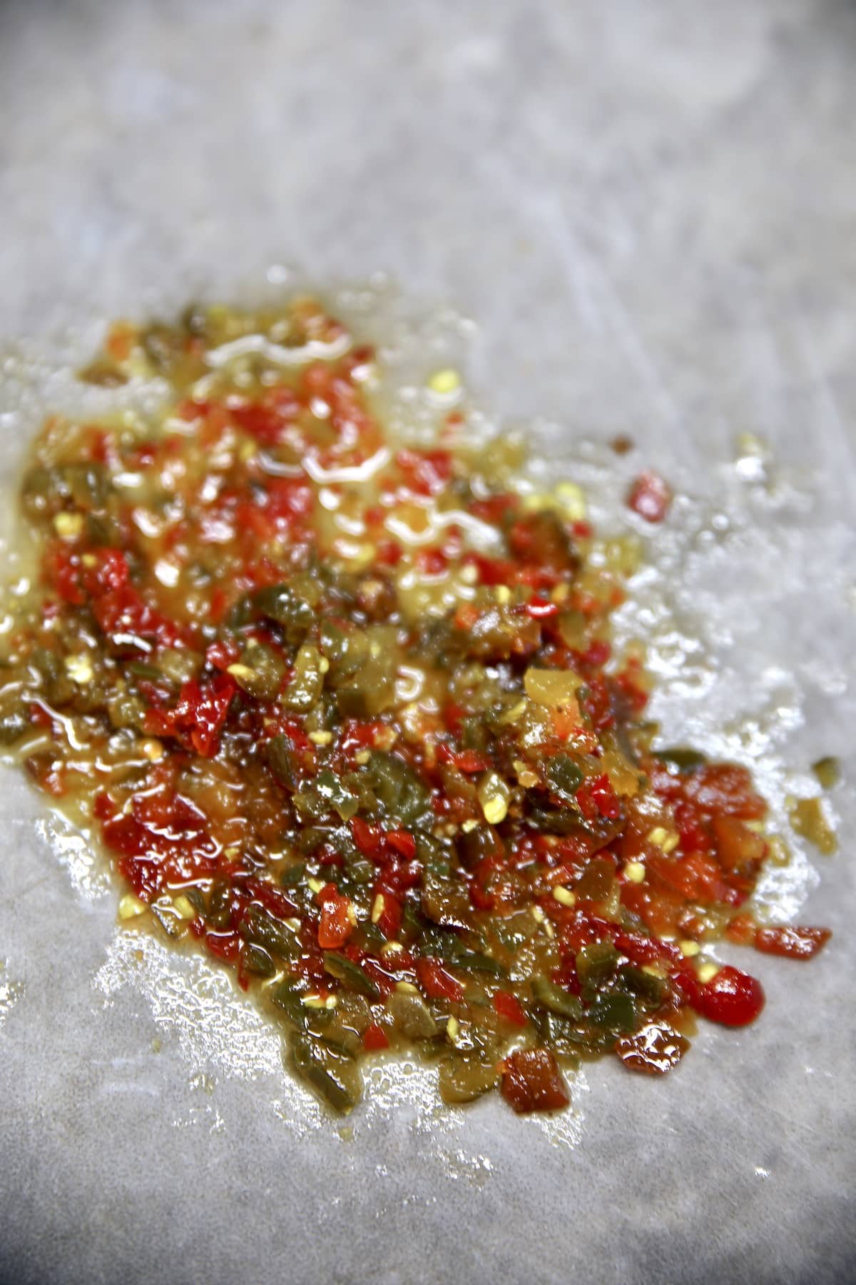 Finely diced red and green candied jalapenos.