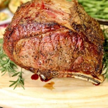 Christmas prime rib roast on a cutting board.