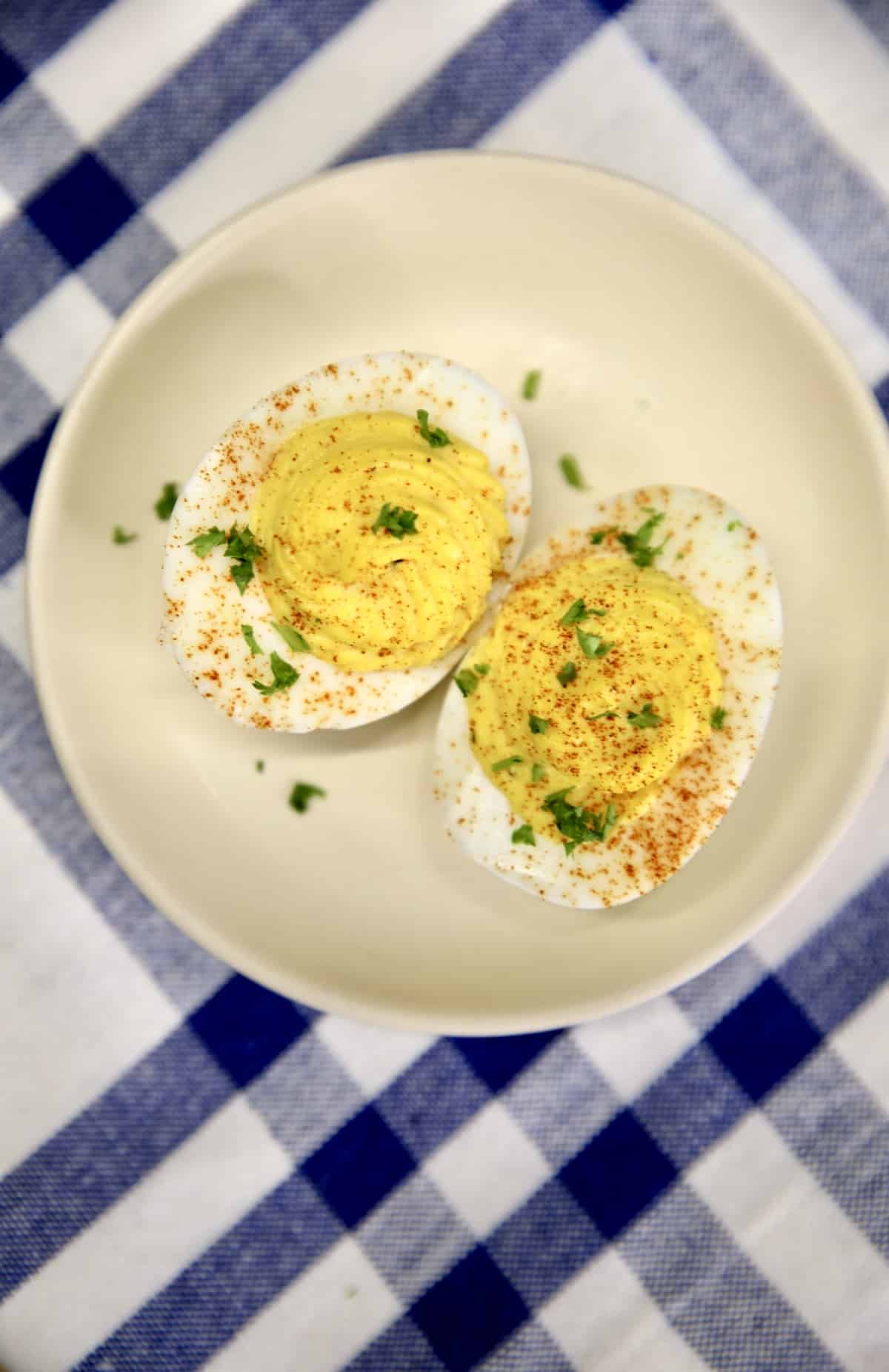 Small plate of 2 deviled eggs.