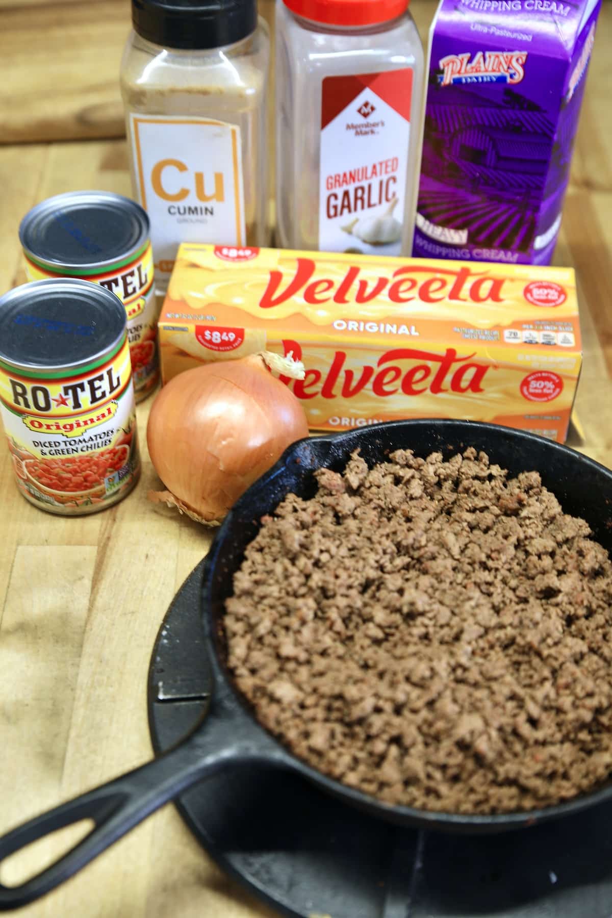 Velveeta and venison queso ingredients.