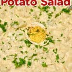 Bowl of Southern potato salad. Text overlay.