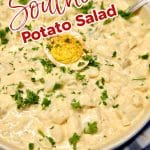 Southern potato salad with deviled egg garnish. Text overlay.