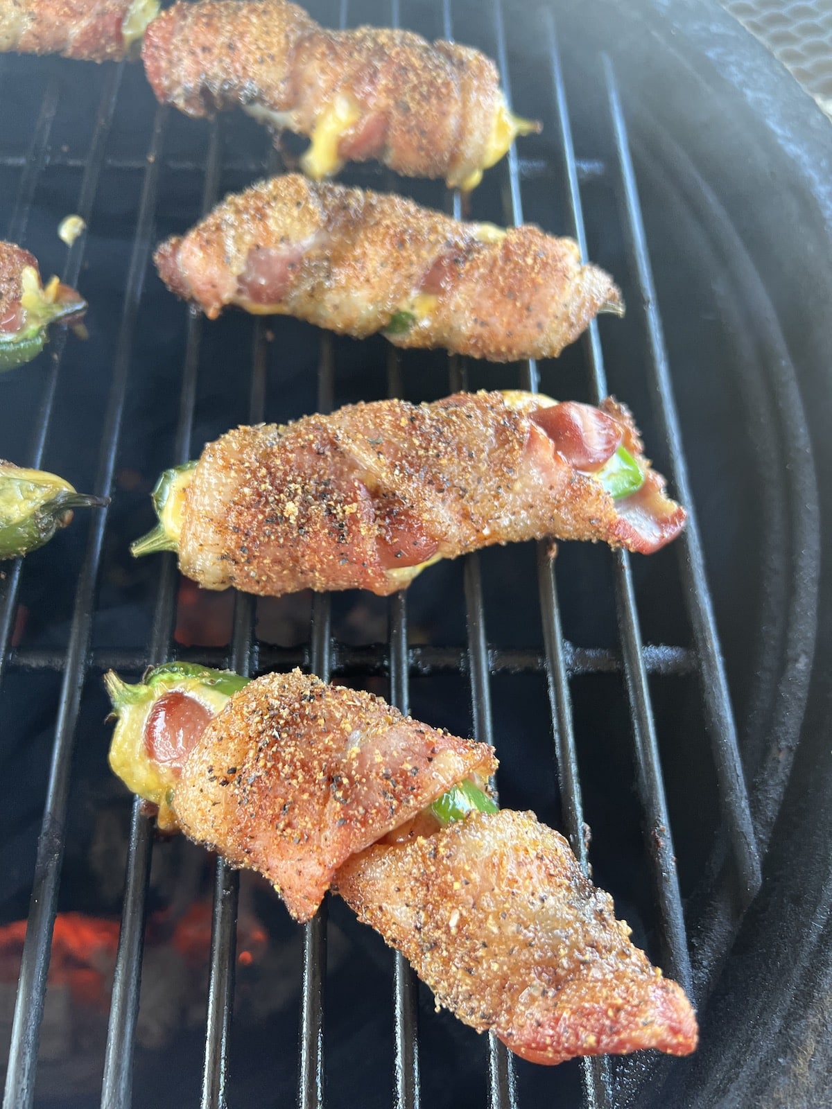 Grilled jalapeno poppers with bacon.