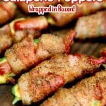 Bacon wrapped jalapeño poppers with text overlay.