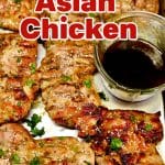 Grilled Asian Chicken on a sheet pan with sauce. Text overlay.