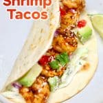 Grilled Shrimp Taco on a plate with text overlay.