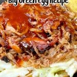 Pulled pork sandwich with bbq sauce & slaw - open faced. Text overlay.