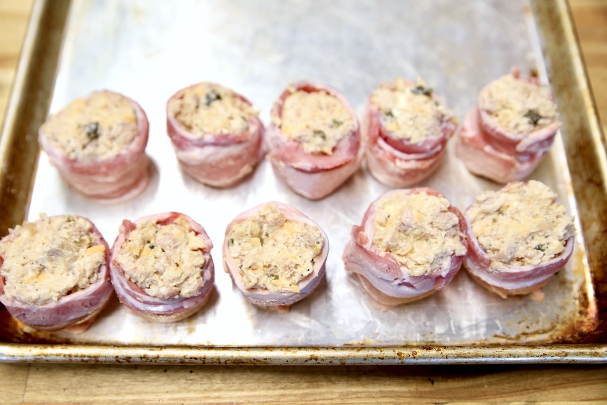 Sheet pan with chicken popper pig shots - ready to grill.