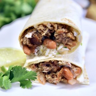 Pulled pork, rice and bean burritos - cut in half and stacked.