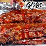Pouring bbq sauce over baby back ribs. Text overlay.