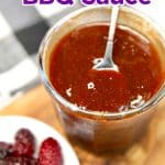 Blackberry BBQ Sauce in a jar with a spoon. Text overlay.