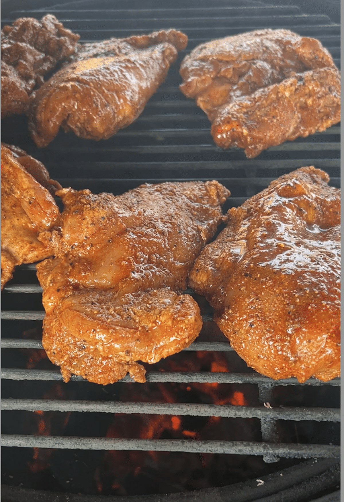 Grilling chicken thighs with shawarma marinade.