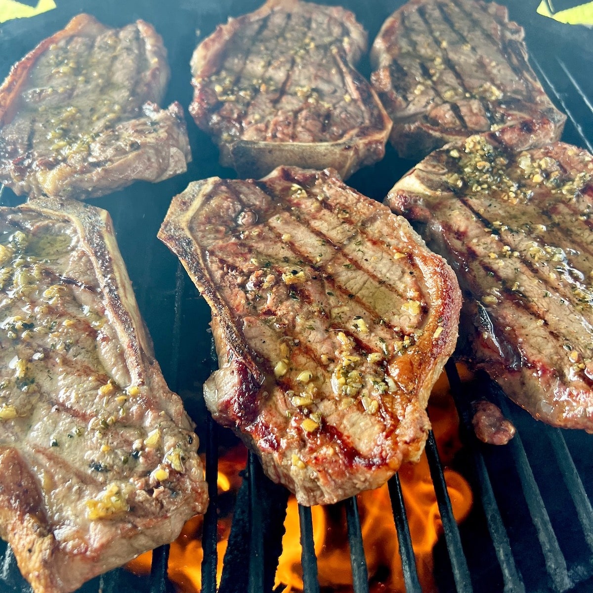 Grilled Steaks with Garlic and Onion Butter