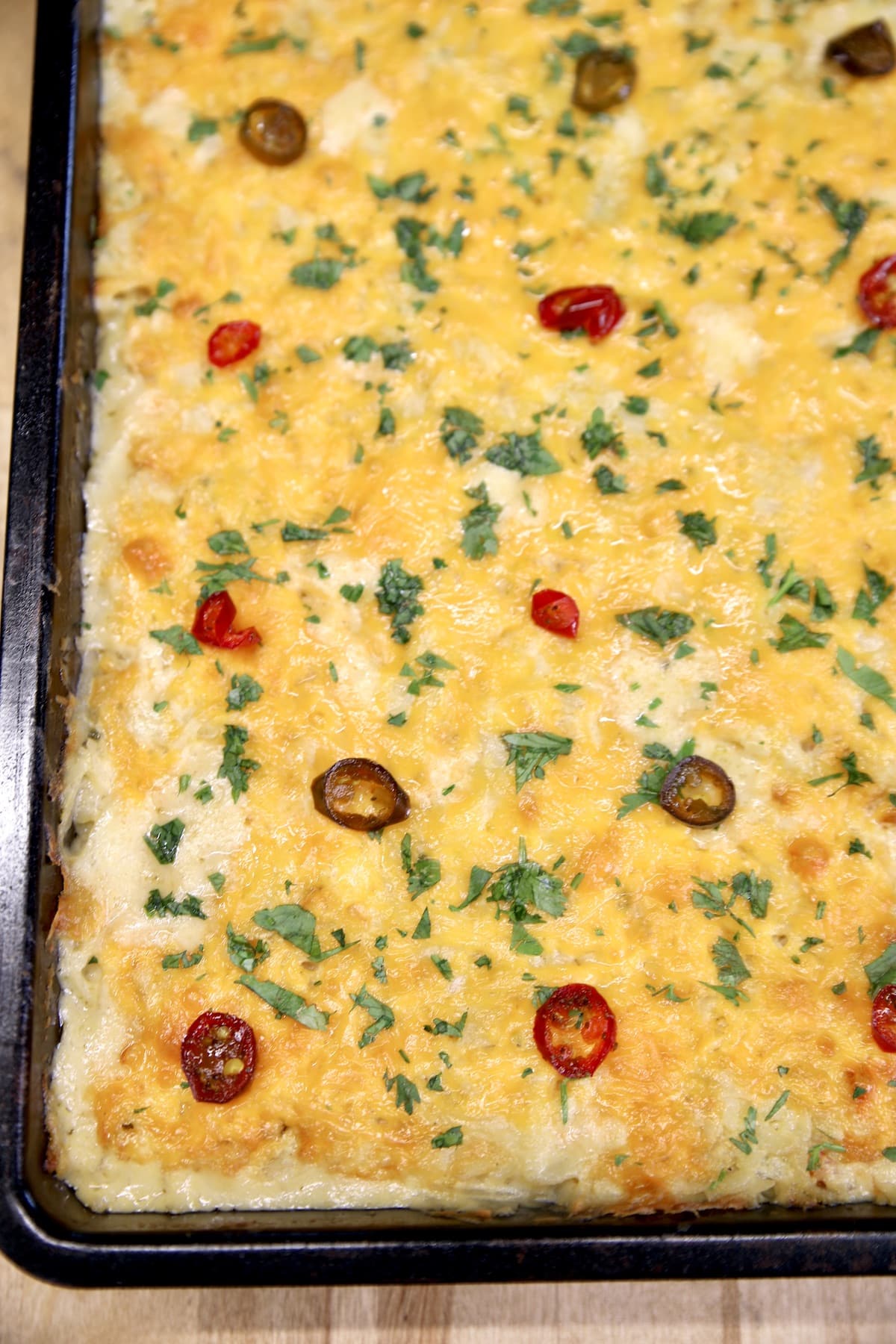 Jalapeno Hashbrown Casserole in a pan.