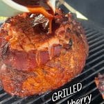 Grilling ham with blackberry glaze. Text overlay.
