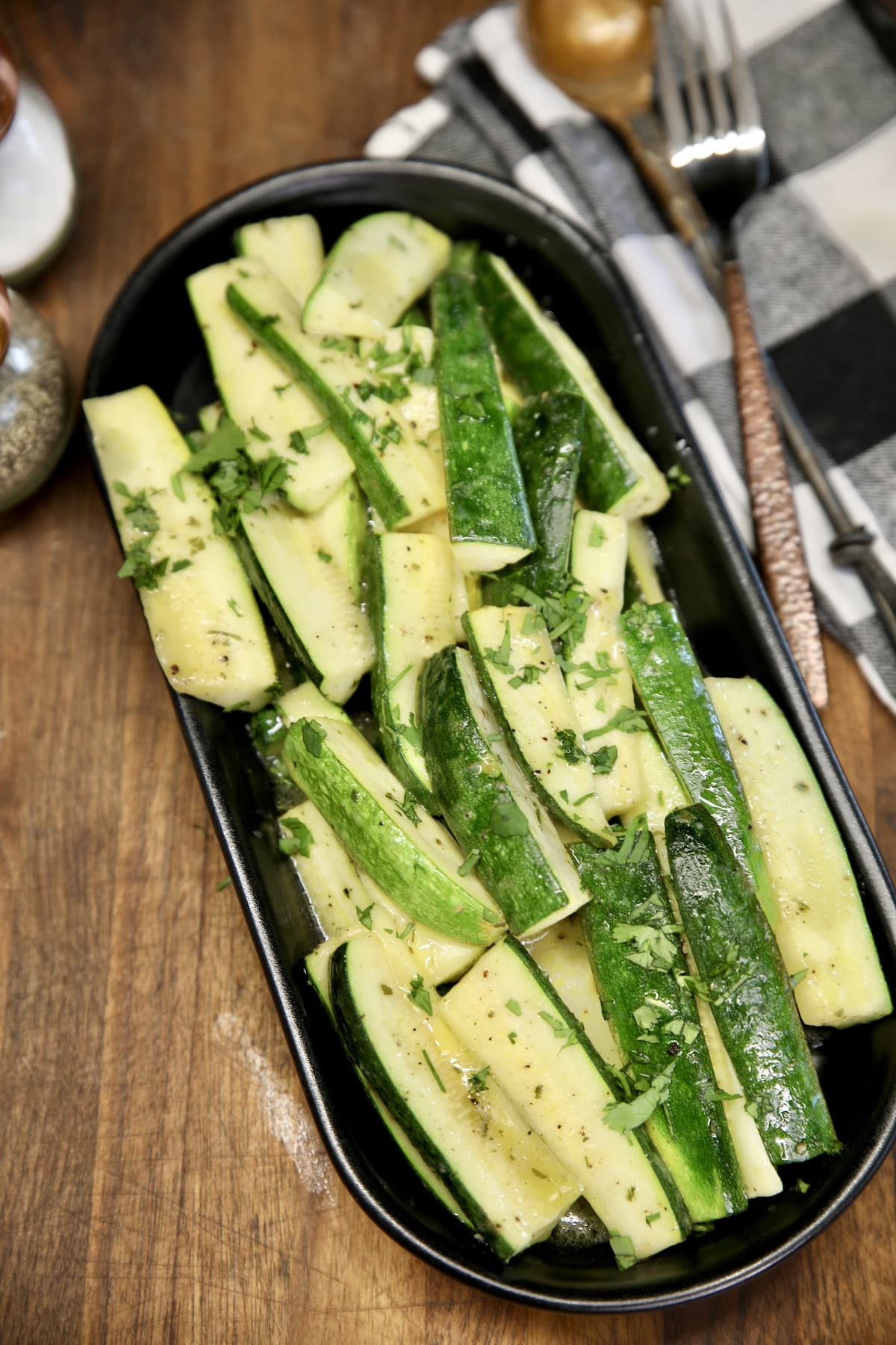 Platter of grilled zucchini with cilantro.