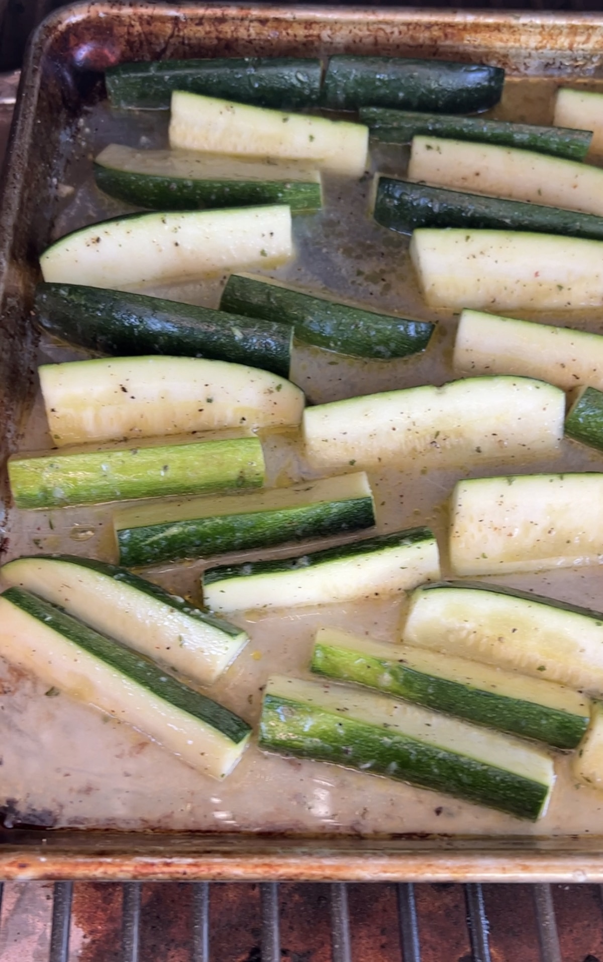 Cooking zucchini spears on a pellet grill.