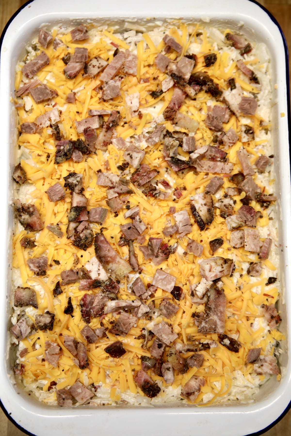 Hashbrown casserole with cheese and brisket.