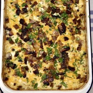 Hashbrown casserole with cheese and brisket.
