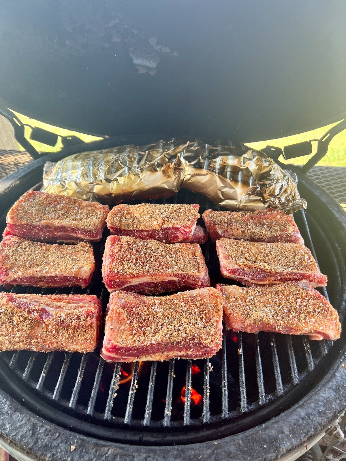 Beef ribs on a grill.