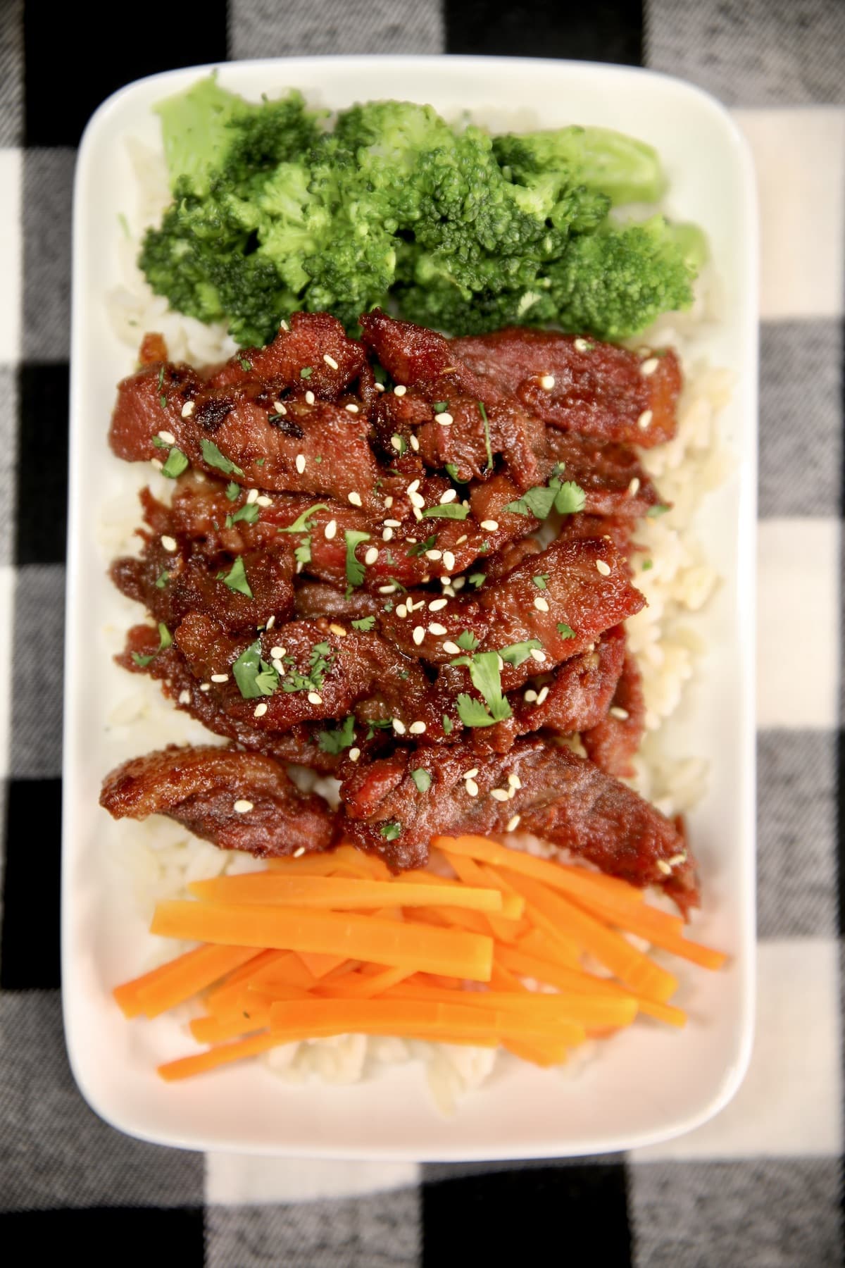 Asian Beef with broccoli, carrots with rice.