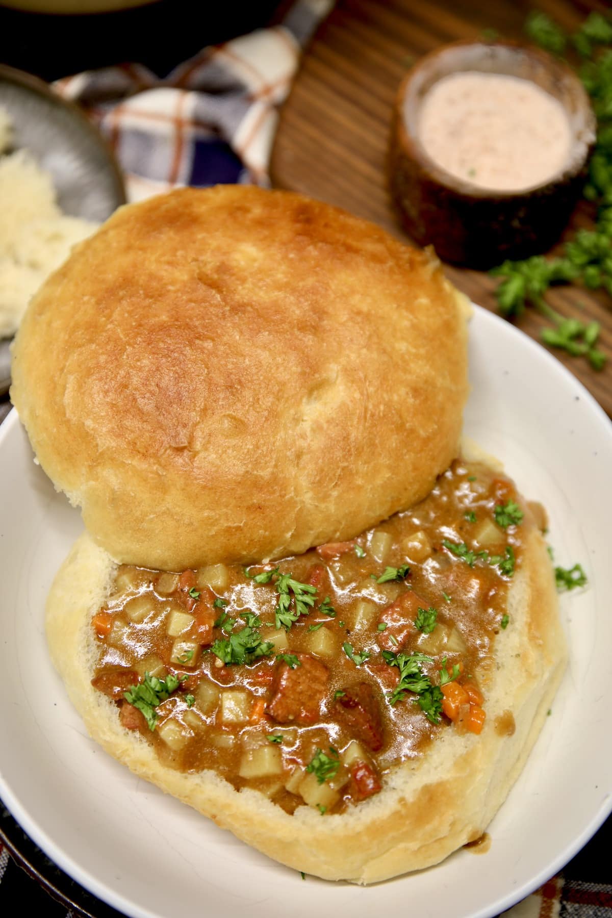 Bread bowl filled with beef and vegetable stew.