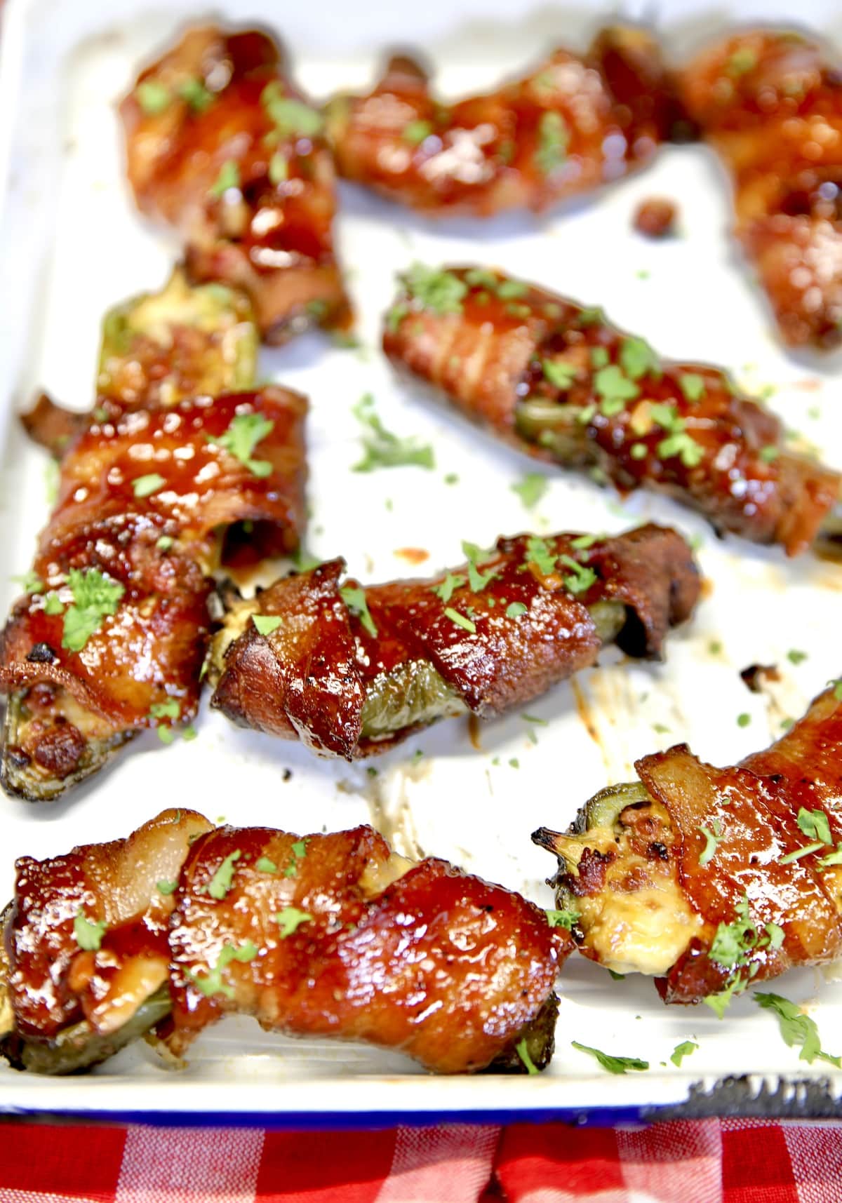Platter of bacon wrapped jalapeno poppers.