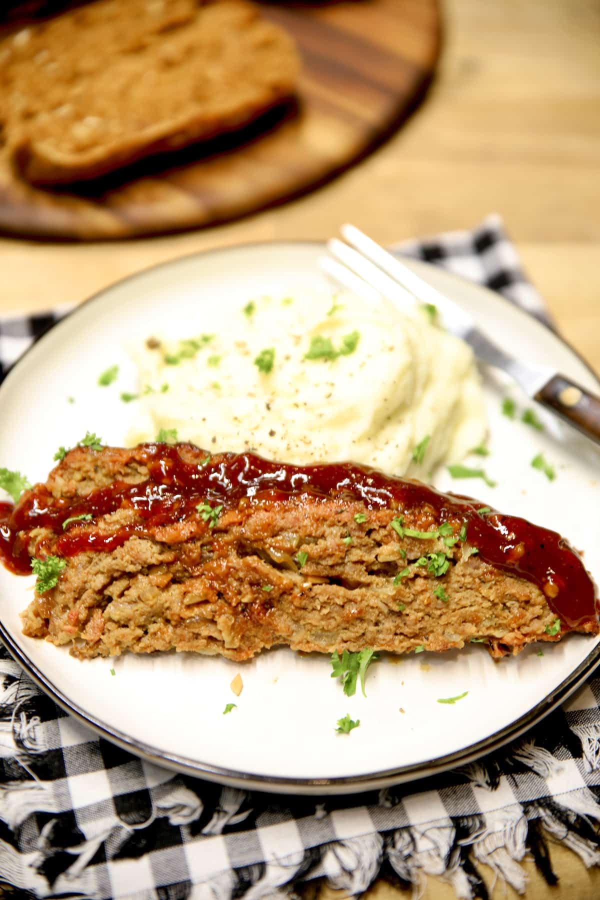 Plate of meatloaf with mashed potatoes.
