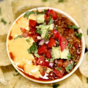 Bowl of chili cheese queso dip.